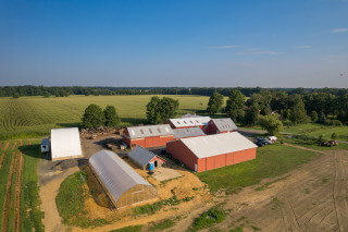 Aerial View of Rolling Fields Tree Farm, Largest Suppllier of Green Giant Arborvitae in the Mid-Atlantic. Several large barns and greenhouses beside open fields